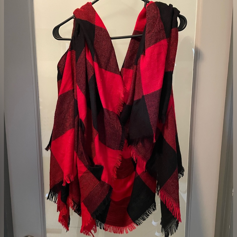 Grace and lace. One size black, and red poncho with pockets..